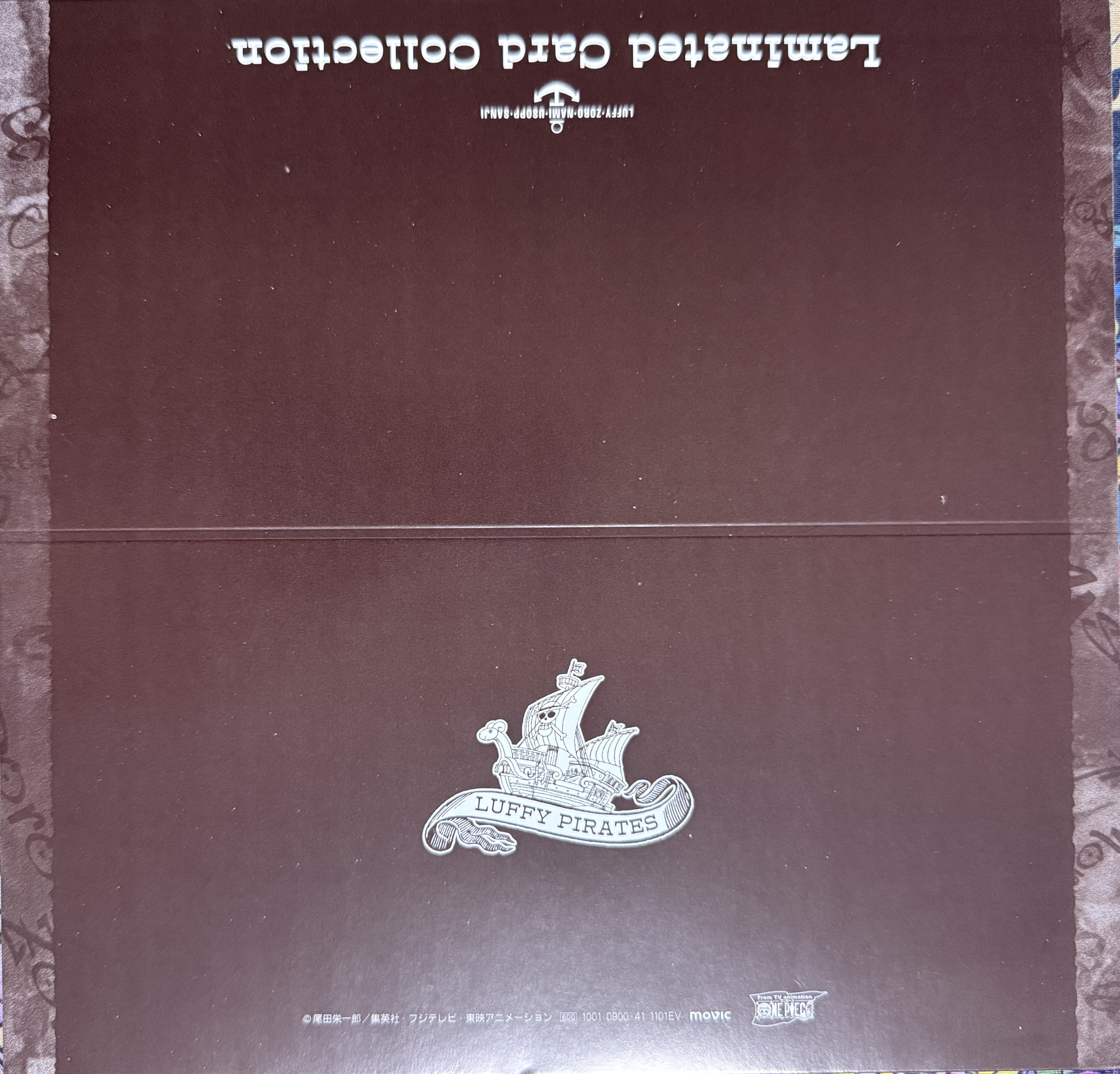 Back of the board: Laminated Card Collection title, Movic logo and printed price