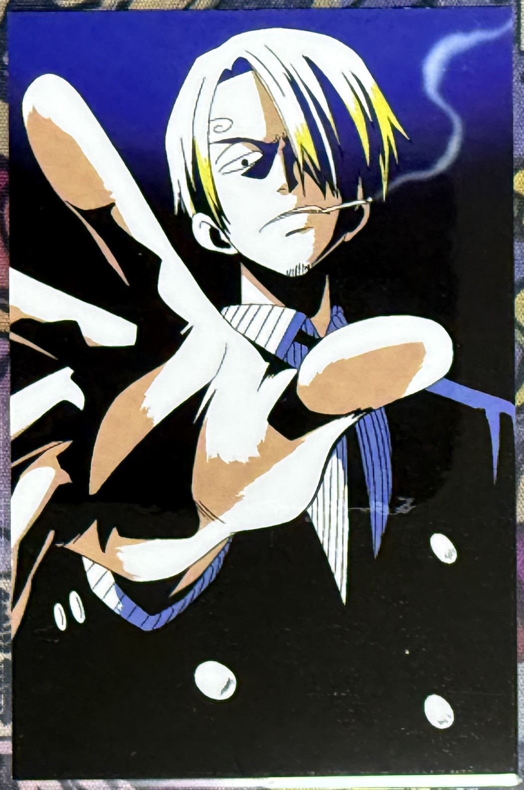 Sanji lami card front, hand reaching toward the viewer
